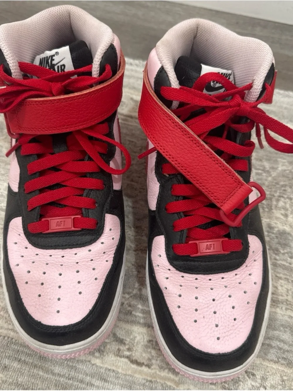 Nike Air Force 1 Pink and Red Black-Accented High-Top Sneakers